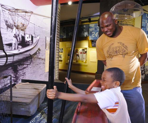 Father and son at Reginald F. Lewis Museum.
