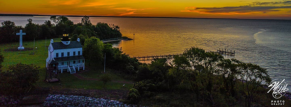 A beautiful orange sunset over the Scenic St. Clement's Island.