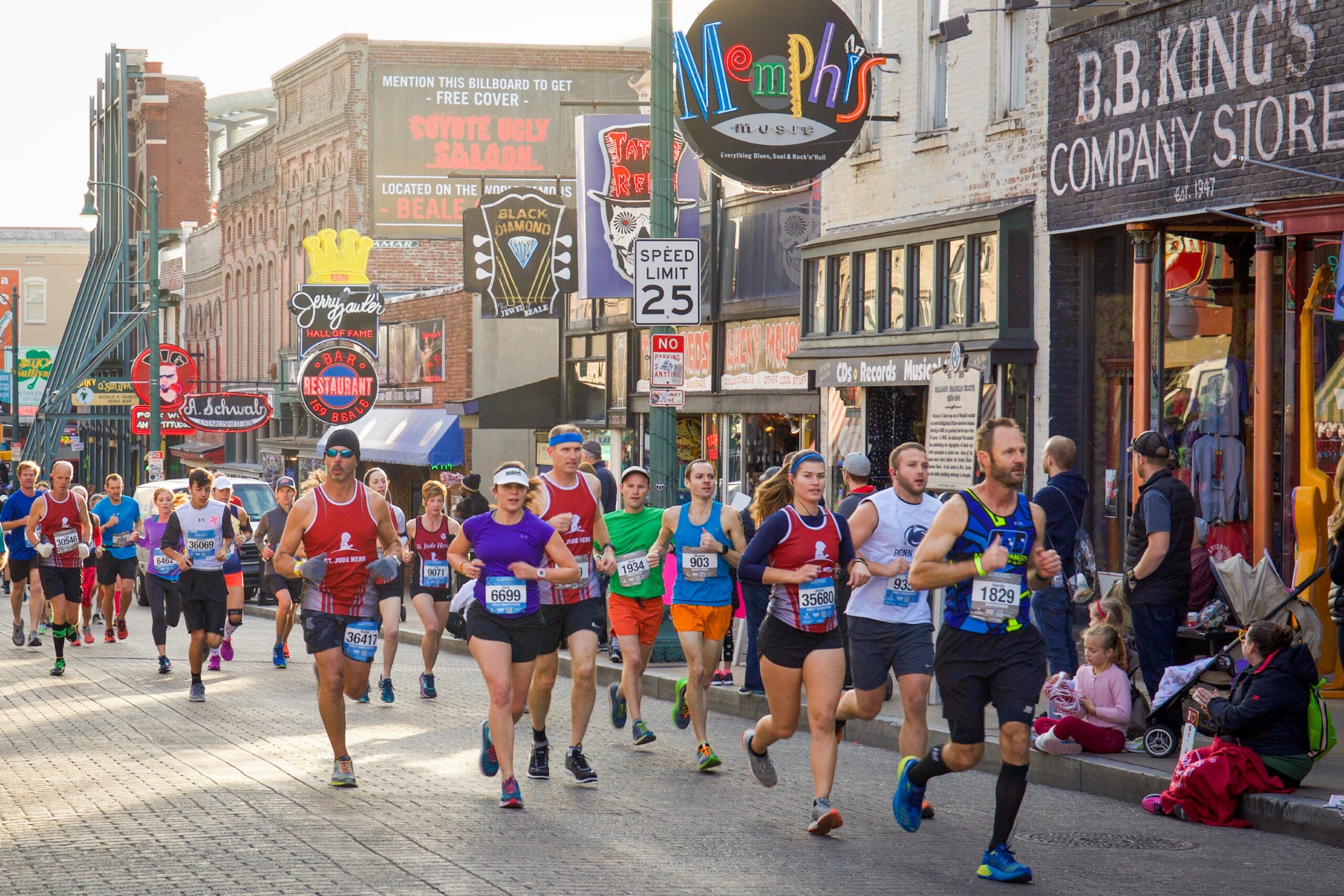 Marathoners running down Beale Street during the St. Jude Marathon