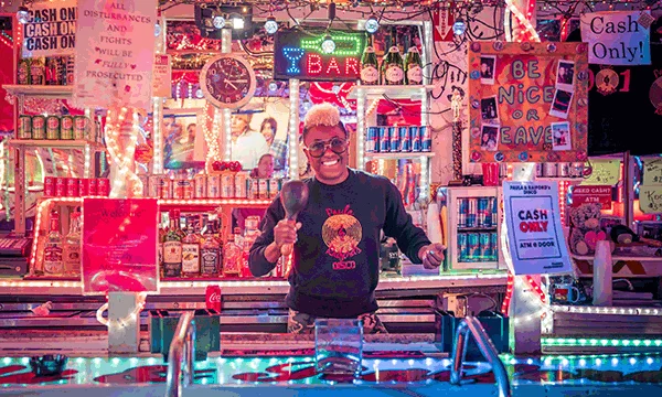 A rotating series of images showing Black-owned businesses and cultural experiences in Memphis, including the interior of Paula & Raiford's Disco, a Payne's BBQ sandwich and the I AM A MAN public art installation outside Clayborn Temple