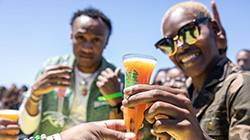 People passing mimosas out at Mimosa Festival Memphis. 