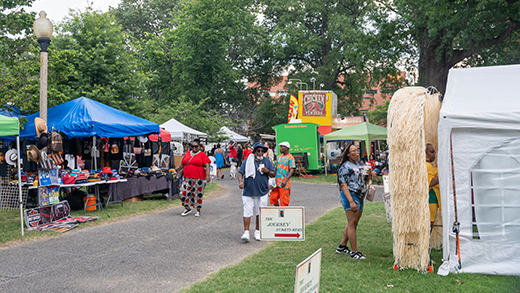 People browsing the booths at the Memphis Juneteenth Festival.