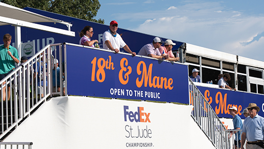 People gathered at the stands entrance for