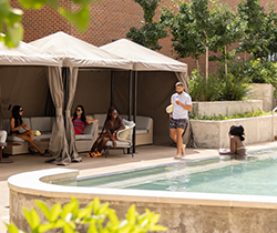 Guests enjoying the cabanas and pool at Hyatt Centric Beale Street Memphis.