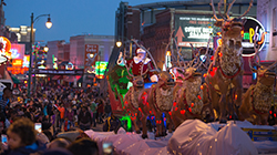 Santa riding his sleigh down Beale Street at the annual Beale Street Holiday Parade.