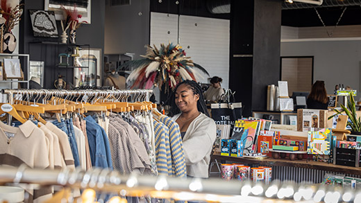 A shopper looking a boutique styles and other goods inside Stock & Belle on South Main Street.