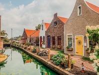 Dutch inspired buildings beside a canal at Nelis' Dutch Village.