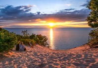Sunset over lake Michigan from the top of a sand dune. 