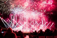 Firework's display over a crowd of spectators.