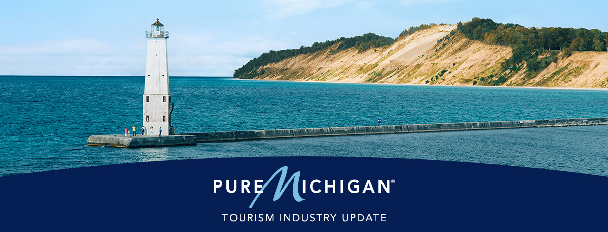 Frankfort lighthouse at the end of a pier with a graphic design that reads "Pure Michigan Industry Update".