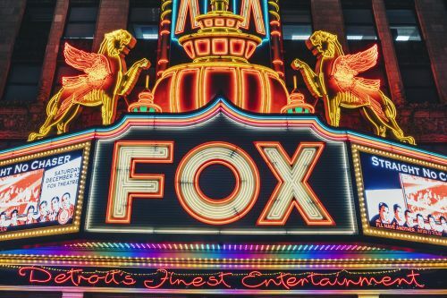 The neon marquee of the Fox Theatre in Detroit at night.