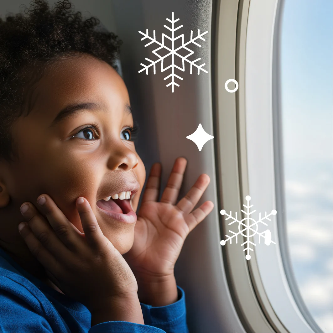 a close up picture of a child on a plane