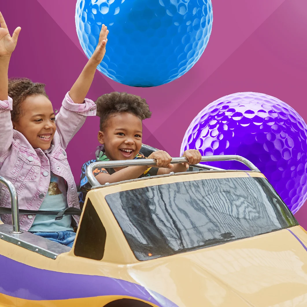 two kids in a car with golf balls behind them over a pink background