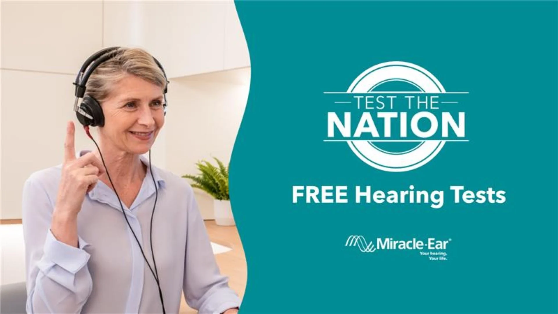 A WOMAN TESTING HER HEARING