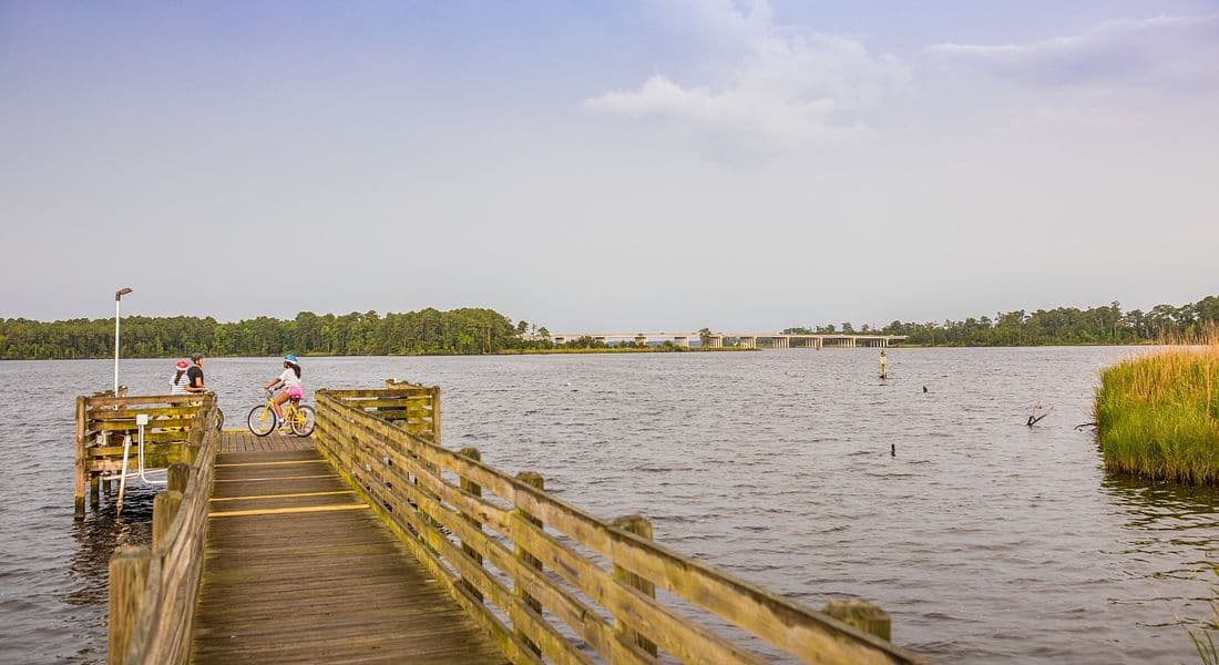 Jacksonville Friends On Bikes at the End of the Pier Over the New River