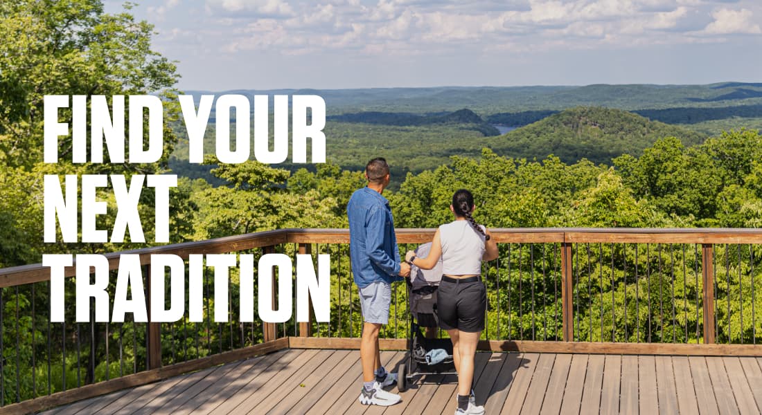 FIND YOUR NEXT TRADITION - A young family enjoys the view at overlook atop Morrow Mountain in Morrow Mountain State Park