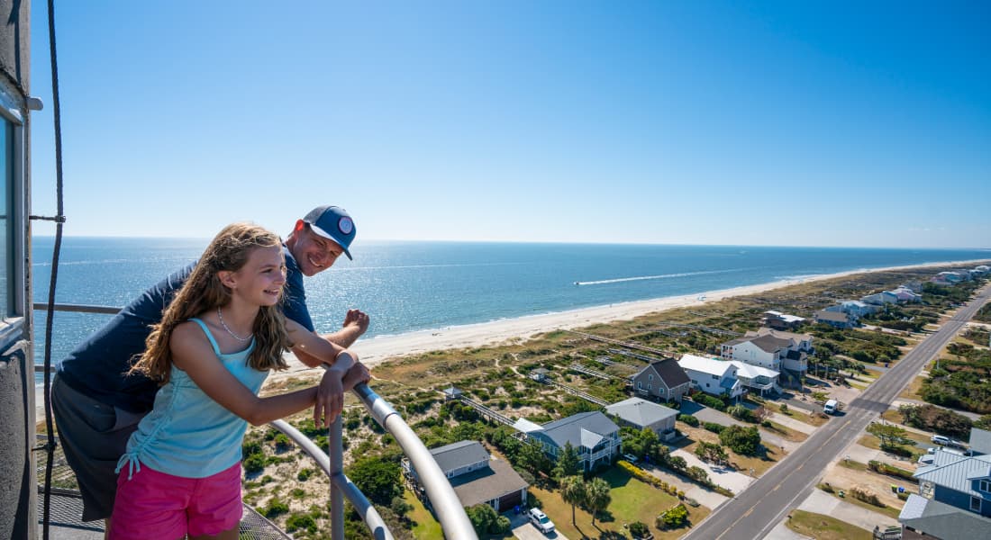 Young man and girl on Oak Island Lighthouse