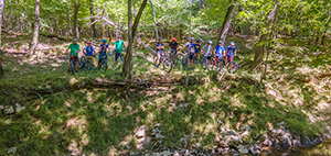 A group of bikers overlooking a river bank in Person County, NC. 