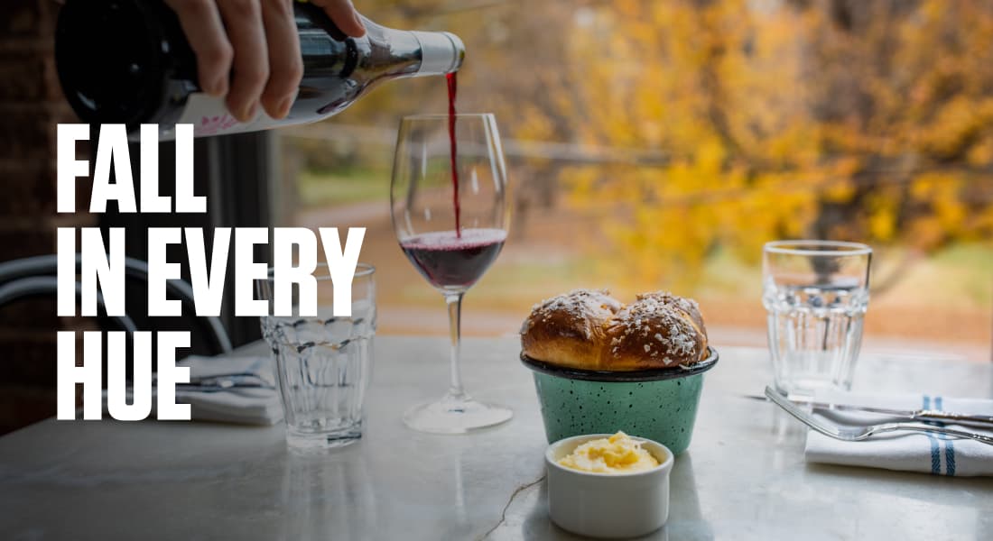 FALL IN EVERY HUE - Red wine being poured beside a muffin at Kindred