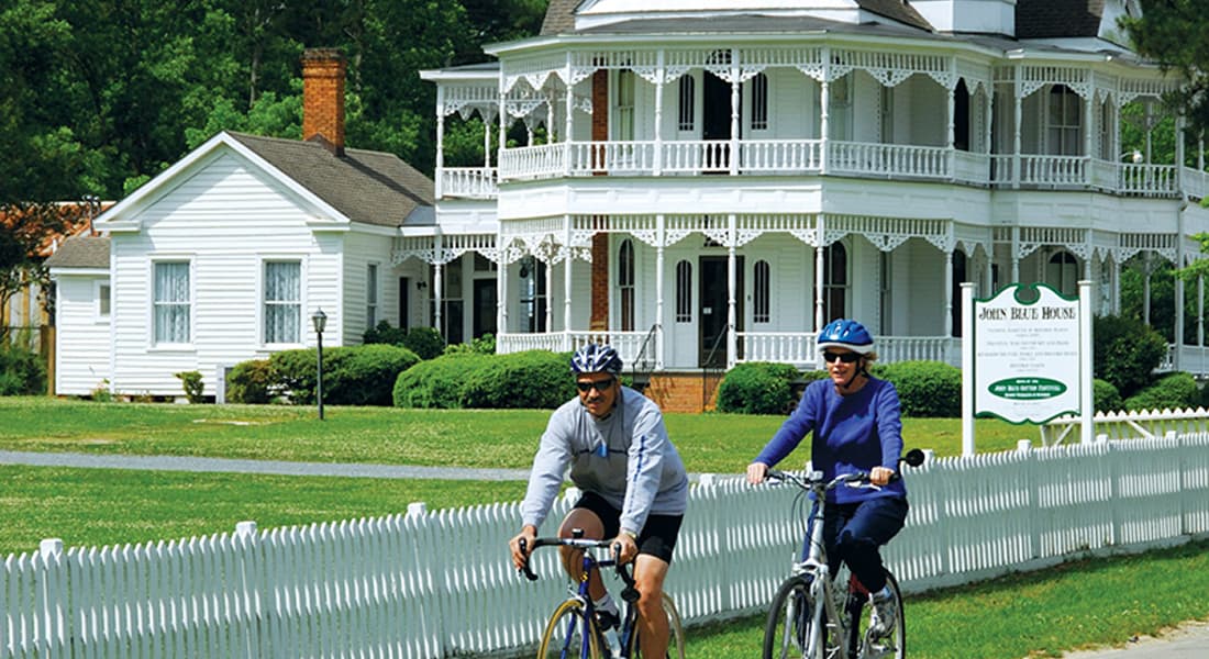 Couple riding bikes in Laurinburg, NC
