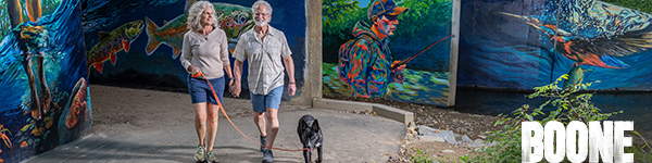 A couple on the middle fork greenway in Boone, NC.