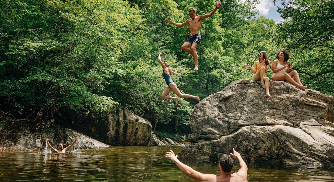 Young people enjoying Sunburst Swimming Hole, Haywood County, NC