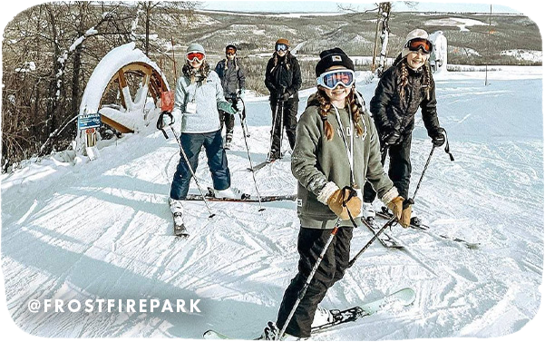 Group of young girls skiing and smiling