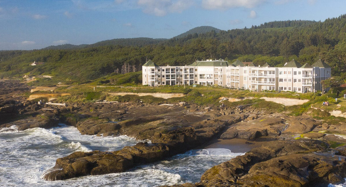 A large building on a coastal bluff.