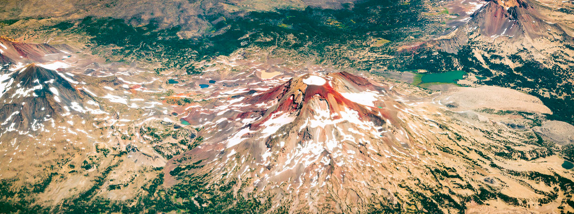 An aerial view of snow-capped mountains.