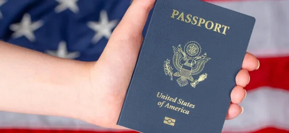 Image of hand holding US passport