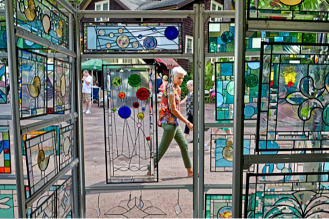 Woman strolling through art display