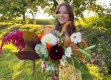 Girl with bouqet of flowers