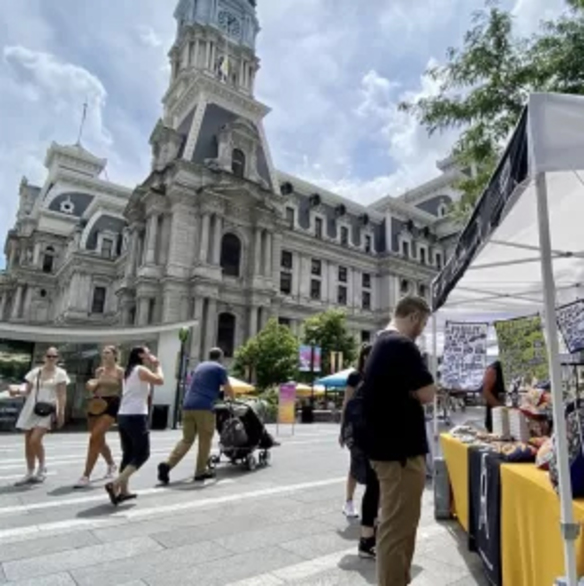 Folks enjoying the sringtime weather at an open air market in Philadelphia