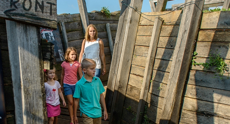 kids walking through a pirate ship
