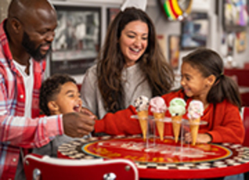 A family eating ice cream cones