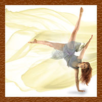 A dancer doing a one-armed hand stand.