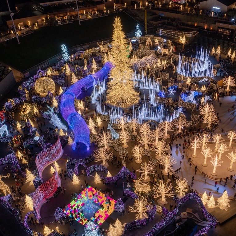 An aerial view of Enchant Christmas in San Jose at nighttime.