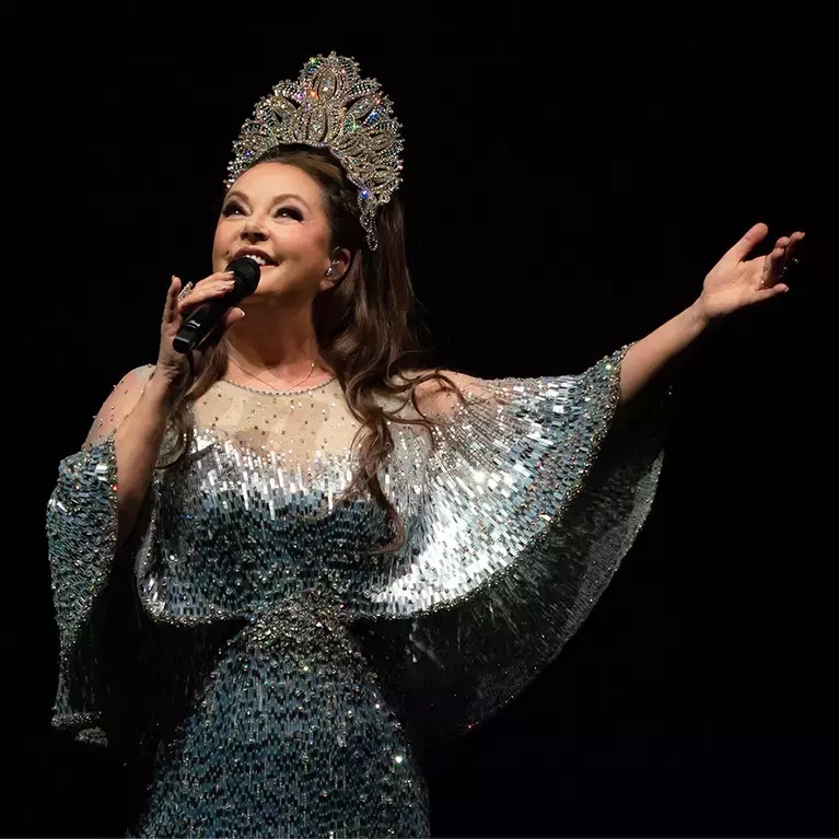 Sarah Brightman performing on stage.