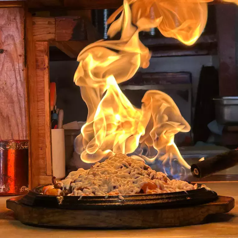 A plate of Flaming Fondue Chicken at Omogari.