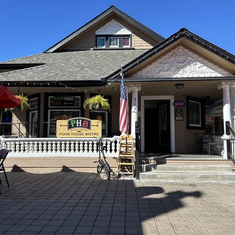 Frontal view of Poor House Bistro in the daytime.