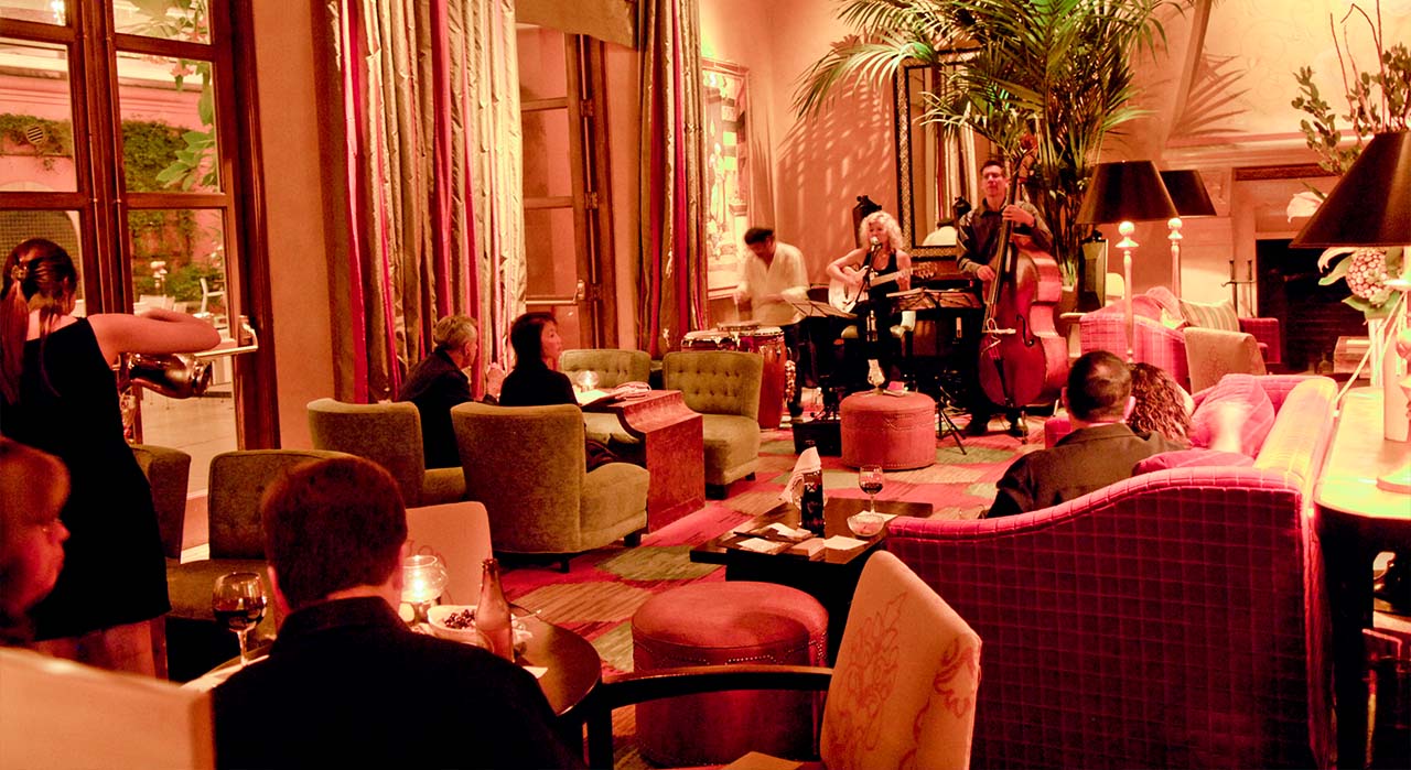 A jazz band playing at a cocktail lounge.
