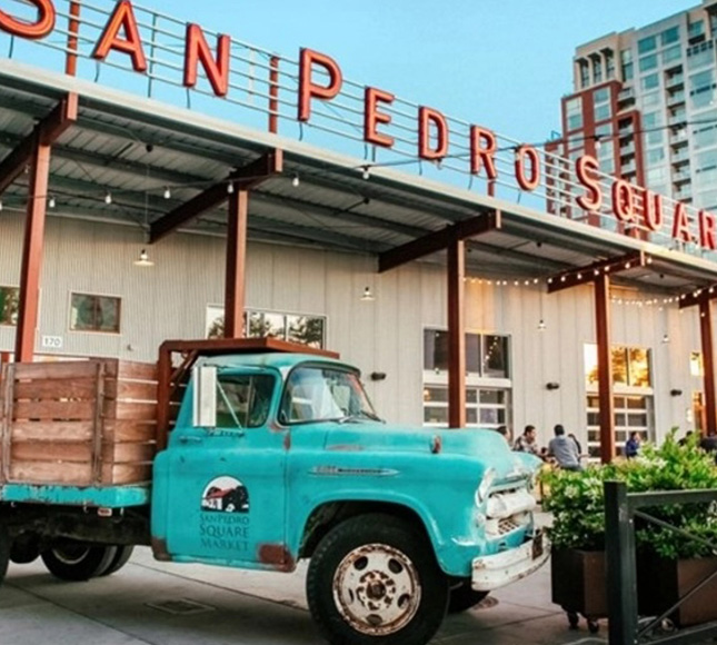 A vintage truck parked in front of San Pedro Square.