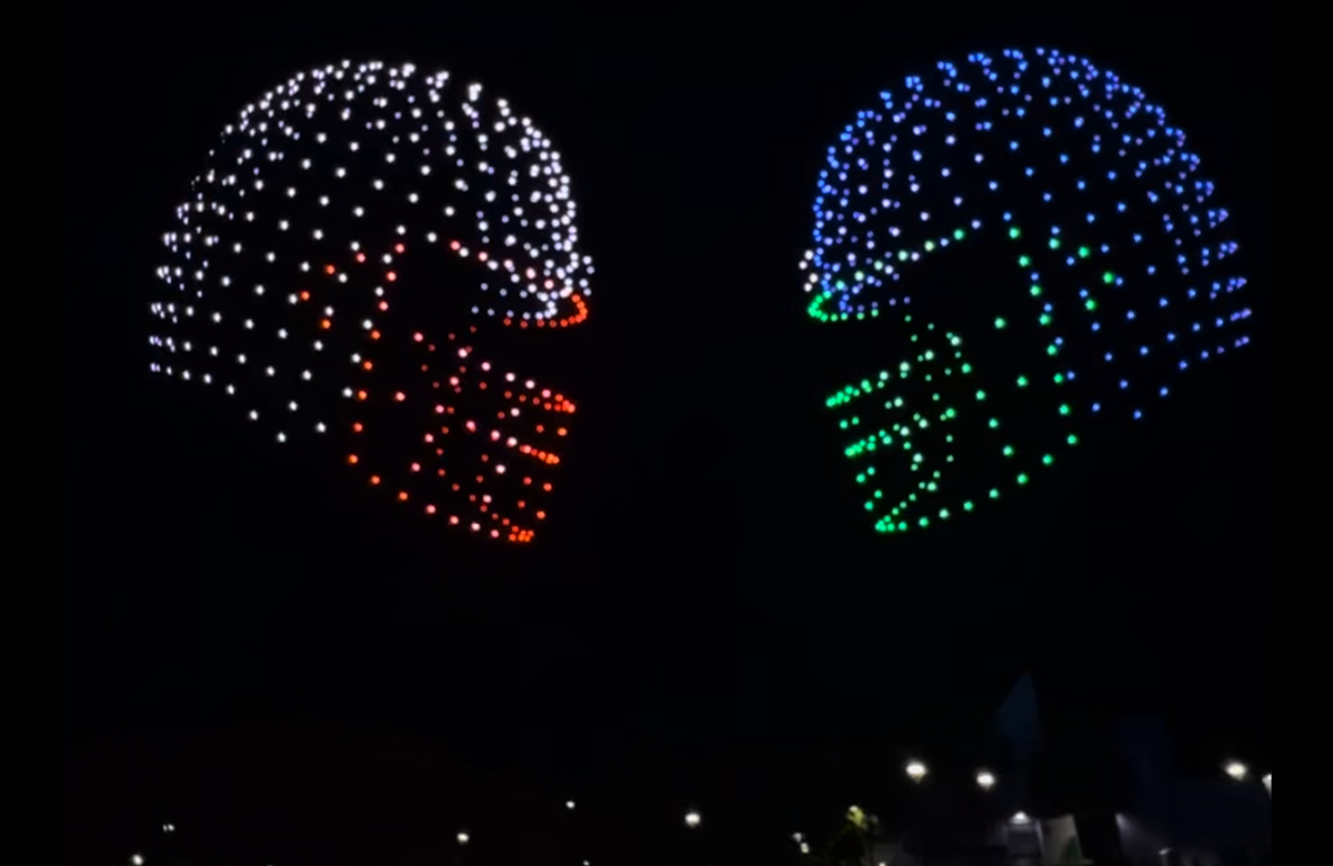 Fans and lights celebrating football week in San José.