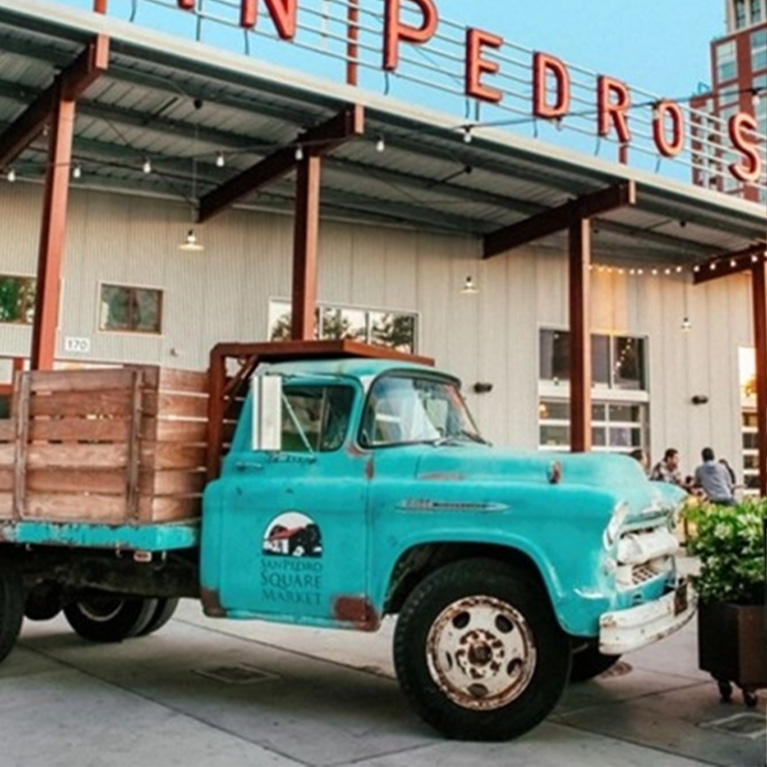 An old blue truck in the San Pedro Square Market.