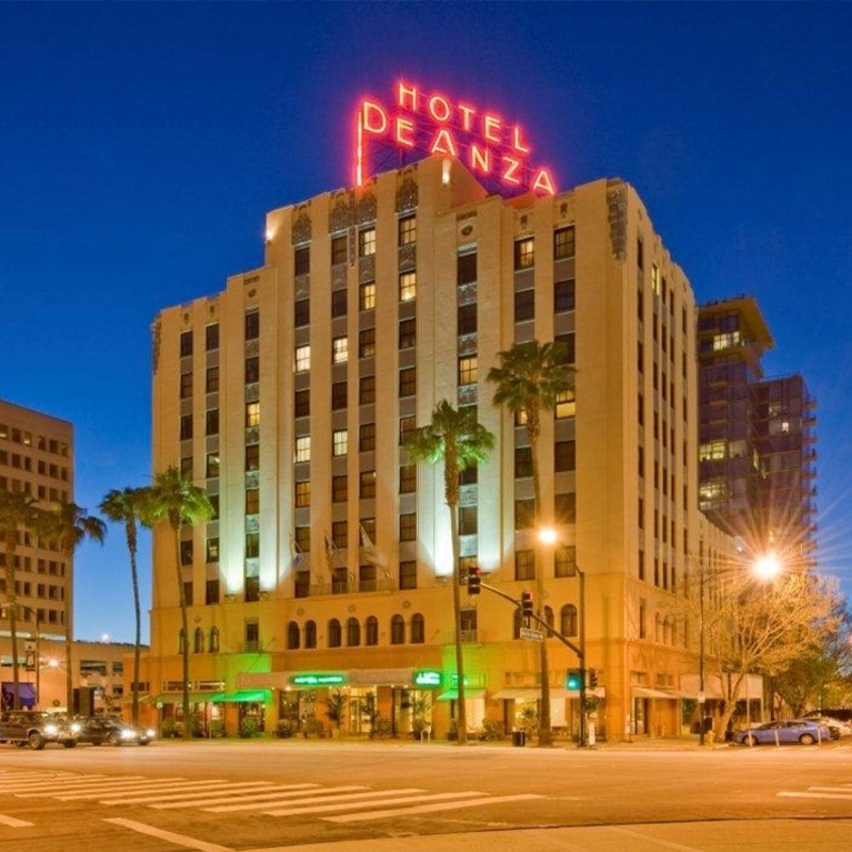 The Hotel de Anza viewed from the street at dusk.