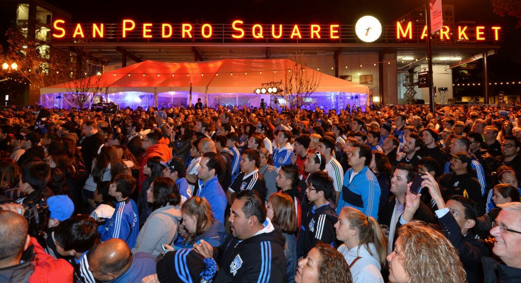 A group eating as San Pedro Market Square.