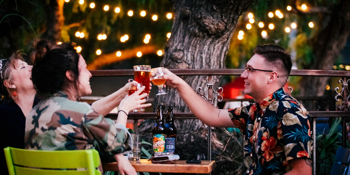 Friends drinking tap beer.