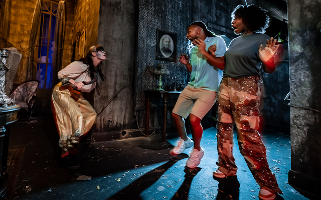 A young couple screaming inside a haunted maze during Howl-O-Scream at Busch Gardens