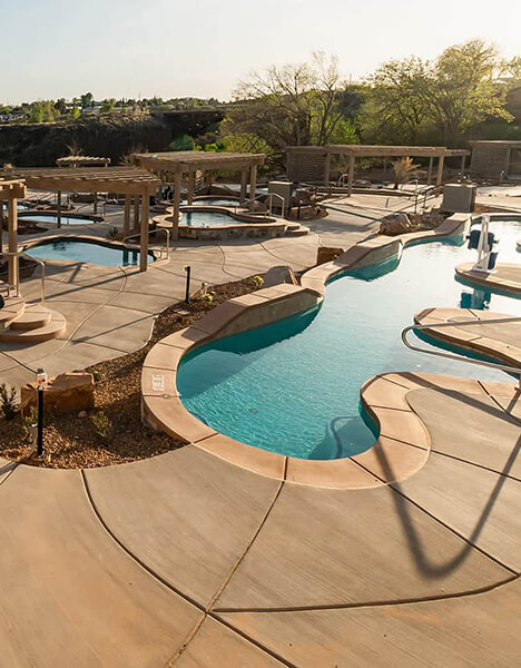 a couple of swimming pools sitting next to each other