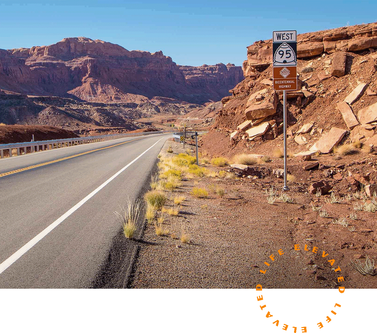 a road in the desert with a sign for state route 95 on the side of it
